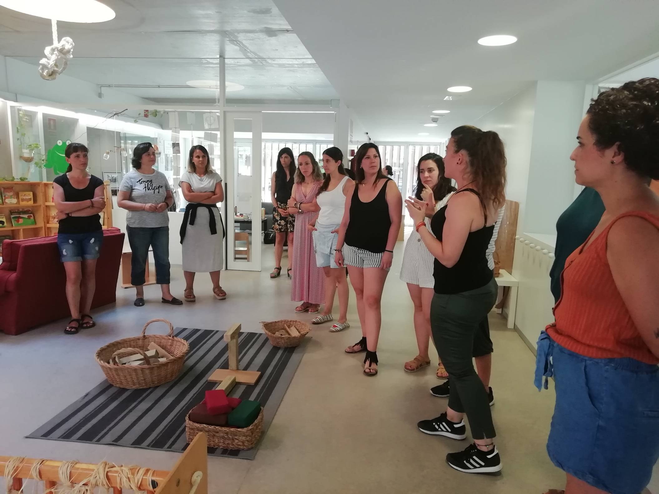 Educadores de l'Arc de Sant Martí i la Granota a la visita realitzada el 9 de juliol.